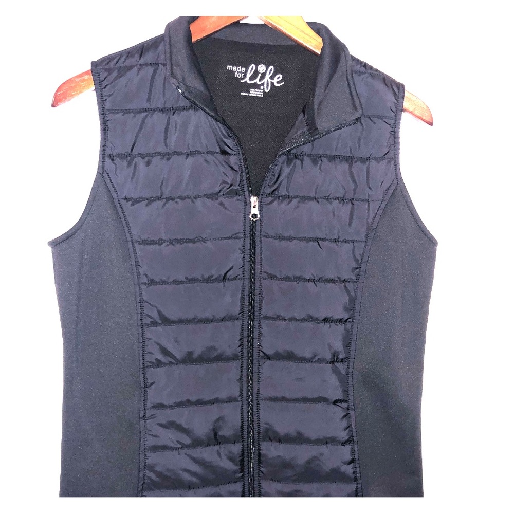 Black quilted vest with pockets